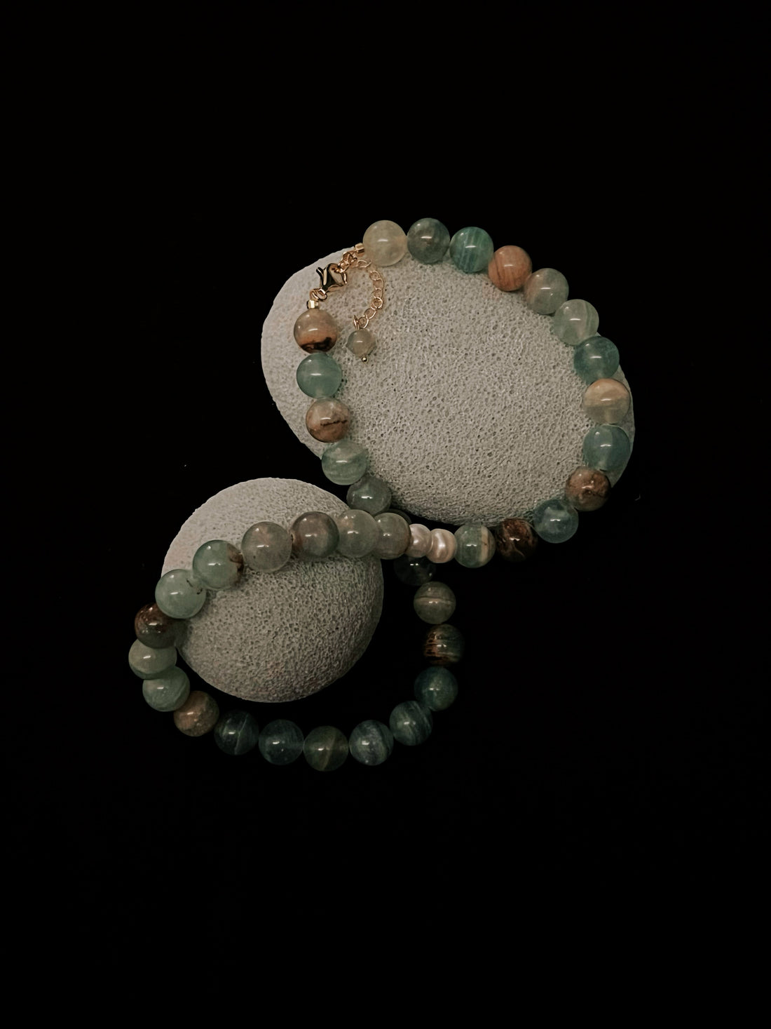 Blue Calcite crystal placed in soft natural light, representing calm, healing energy and peaceful summer vibes
