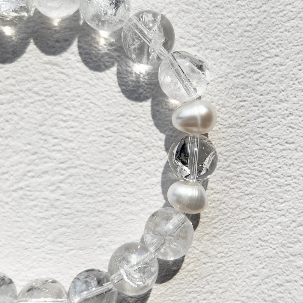 Close-up of Azeztulite beads showing clarity and healing energy