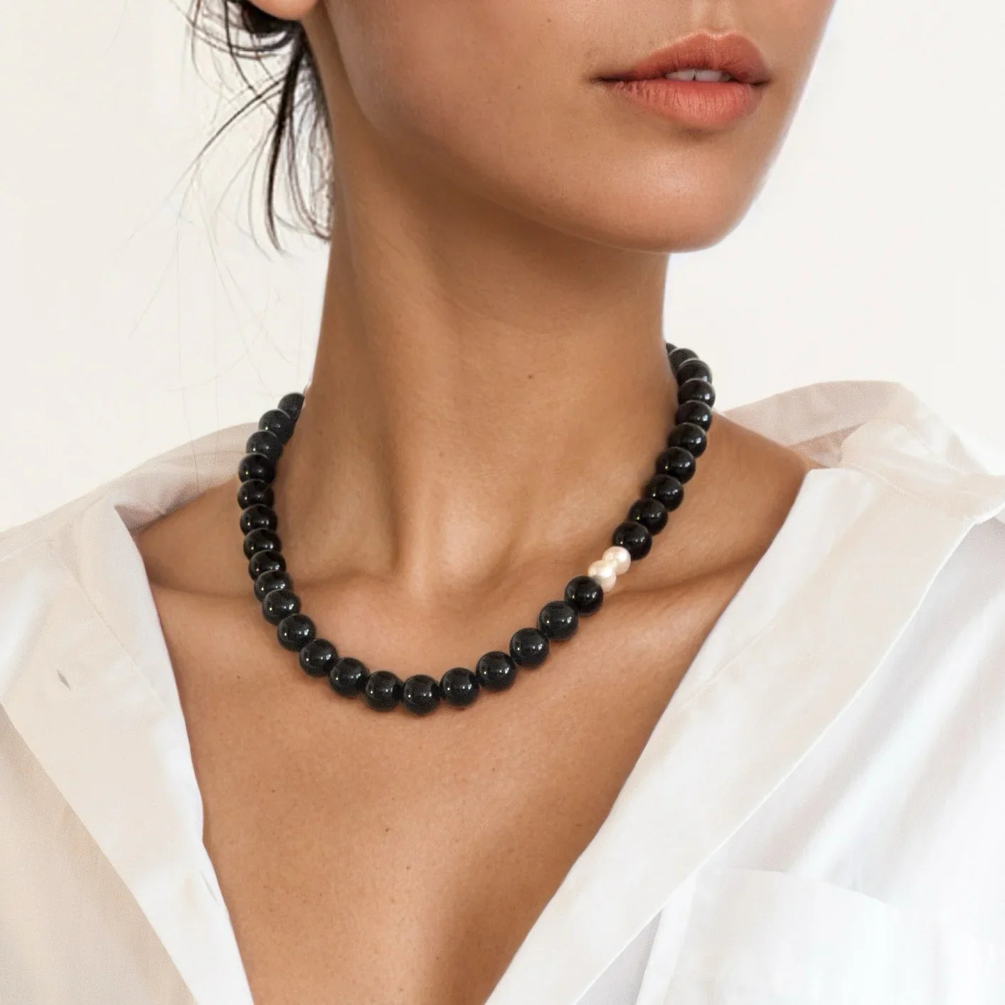 Obsidian necklace on model for inner power and emotional balance