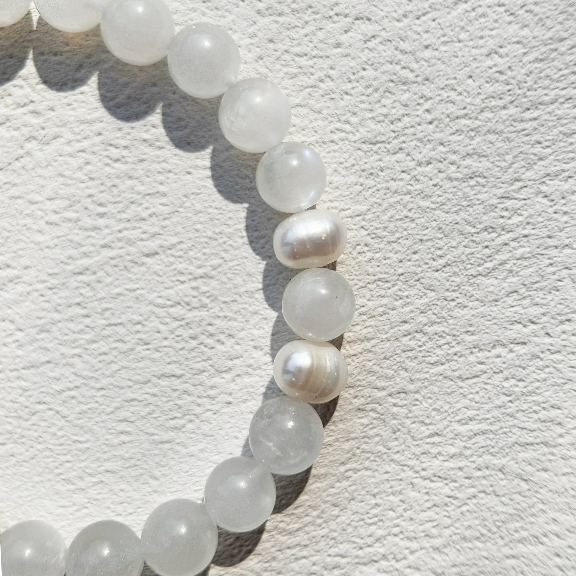 Close-up of Blue Moonstone and pearl details for emotional healing