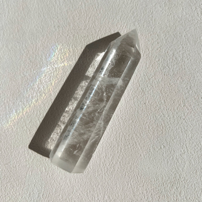 Crystal or mineral specimen on a light gray background