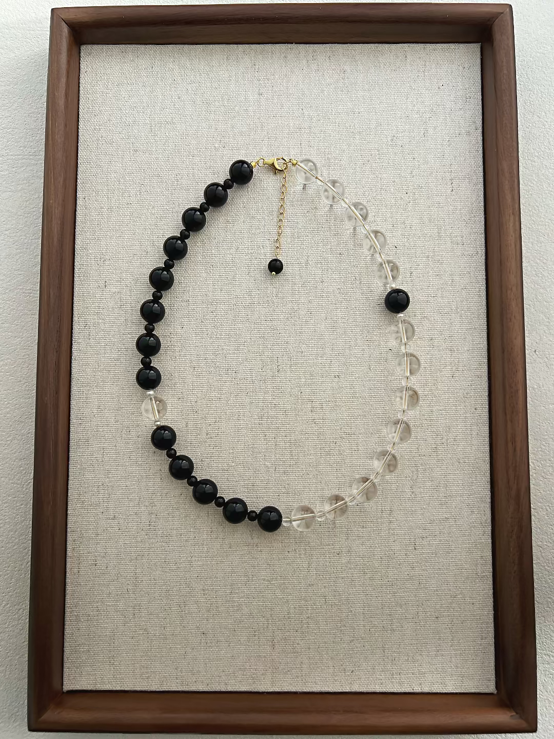 Full layout of the minimalist Yinyang necklace, highlighting the balanced composition of natural gemstones and the luxury 18k gold-plated sterling silver finish.
