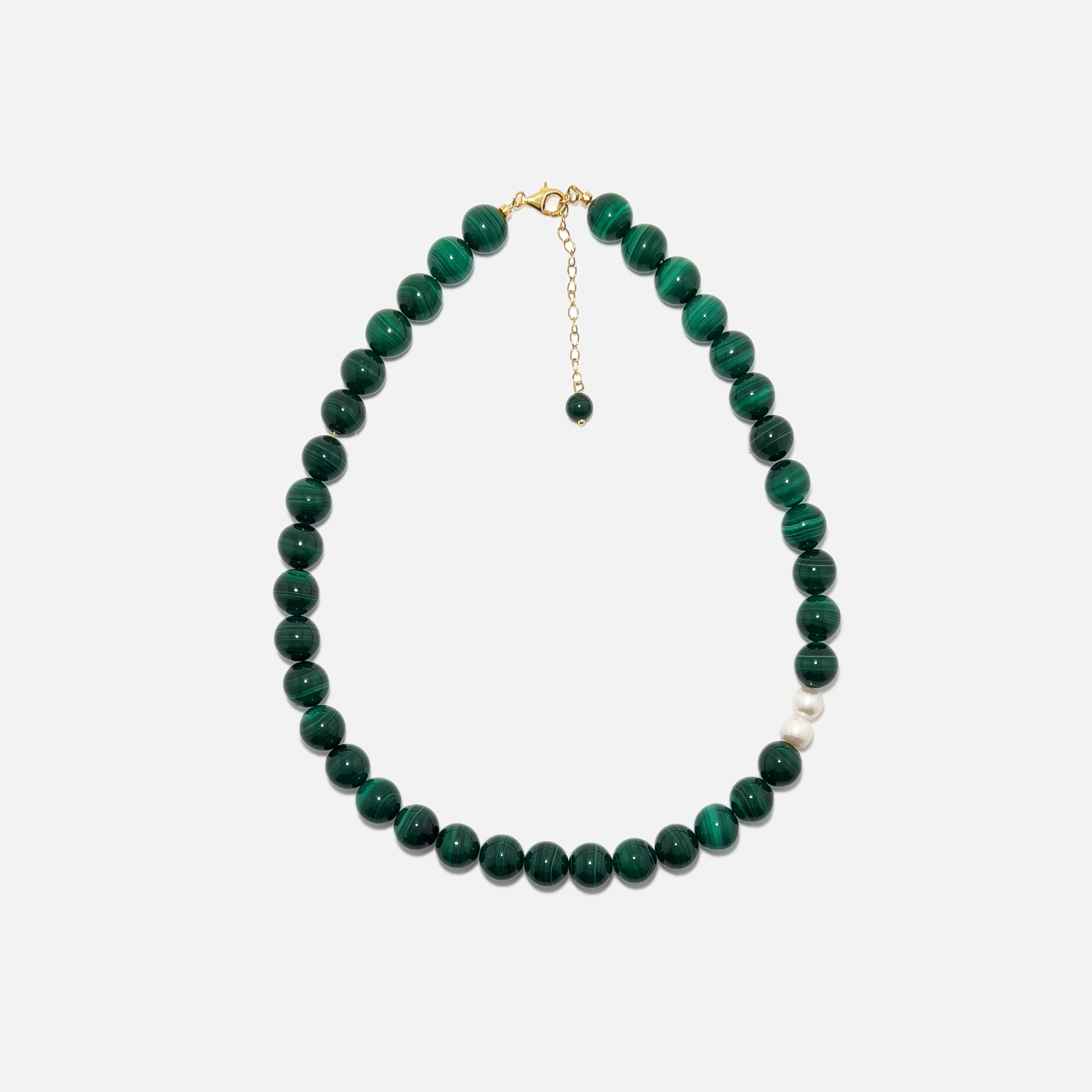 Handmade Malachite crystal necklace with freshwater pearls on white background, rich green tones and stylish design.