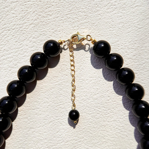 Close-up of Obsidian beads for shielding and clarity