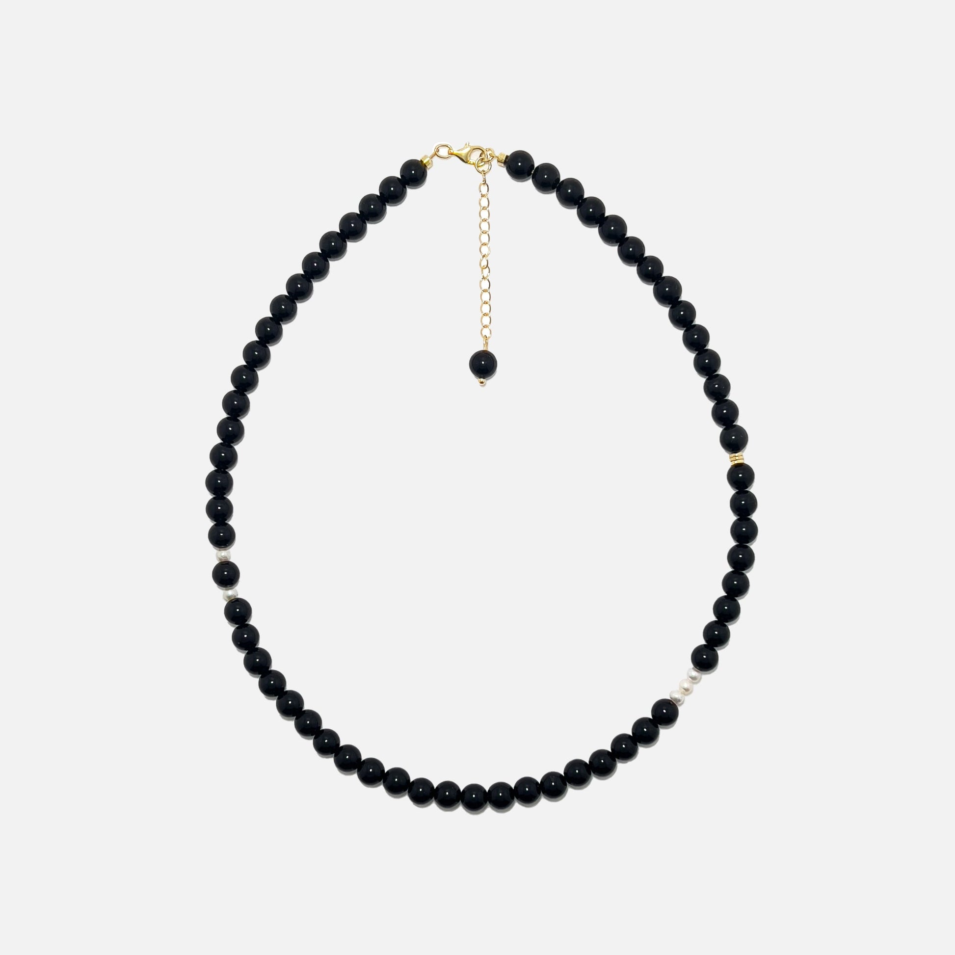 Obsidian crystal necklace with 6mm natural gemstone beads, freshwater pearls, and gold accents on a white background. Handmade for grounding, protection, and everyday style.