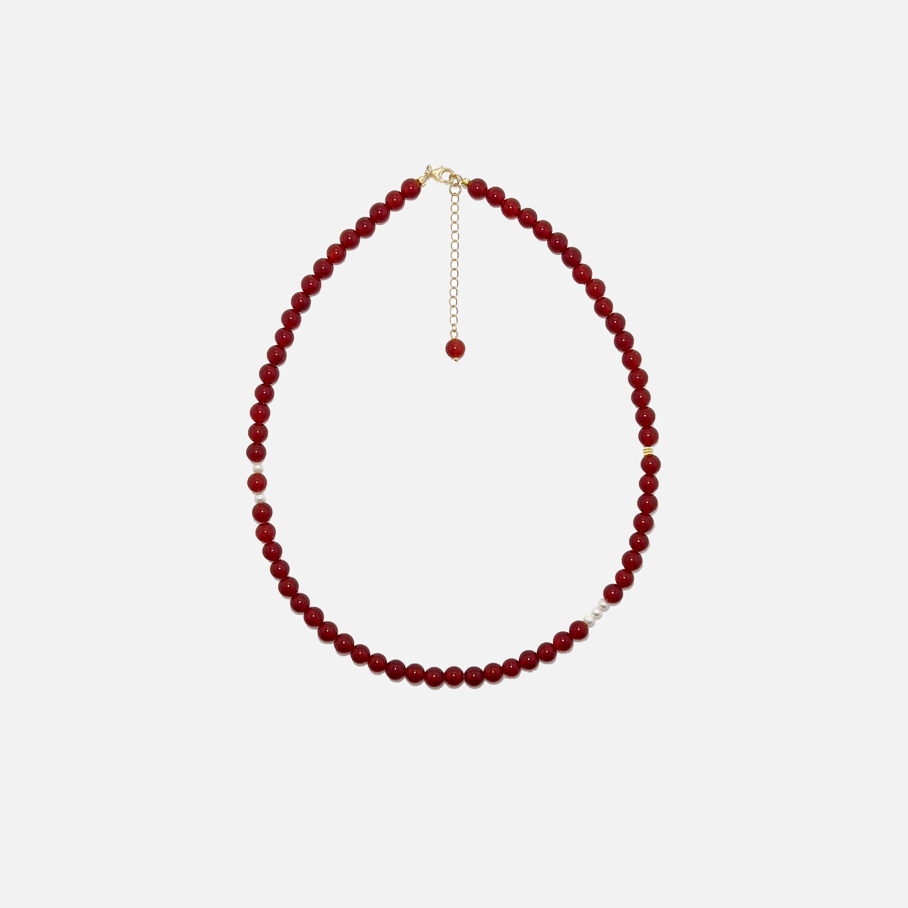 Red Agate crystal necklace with 6mm beads, freshwater pearls, and gold accents on a white background – handmade and stylish, perfect for daily grounding and confidence.