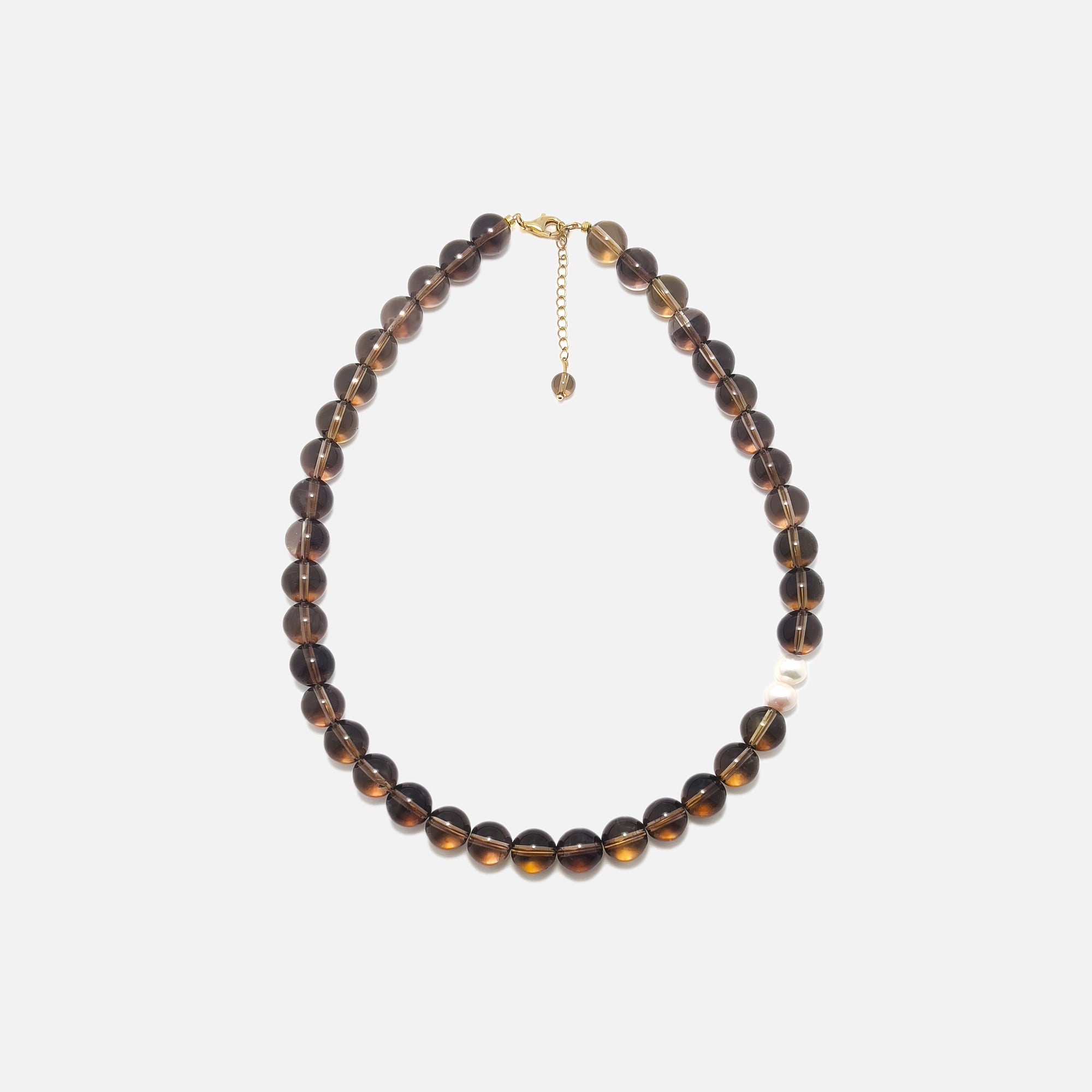 Handmade Smoky Quartz crystal necklace with freshwater pearls on white background – grounding and protective natural gemstone jewelry