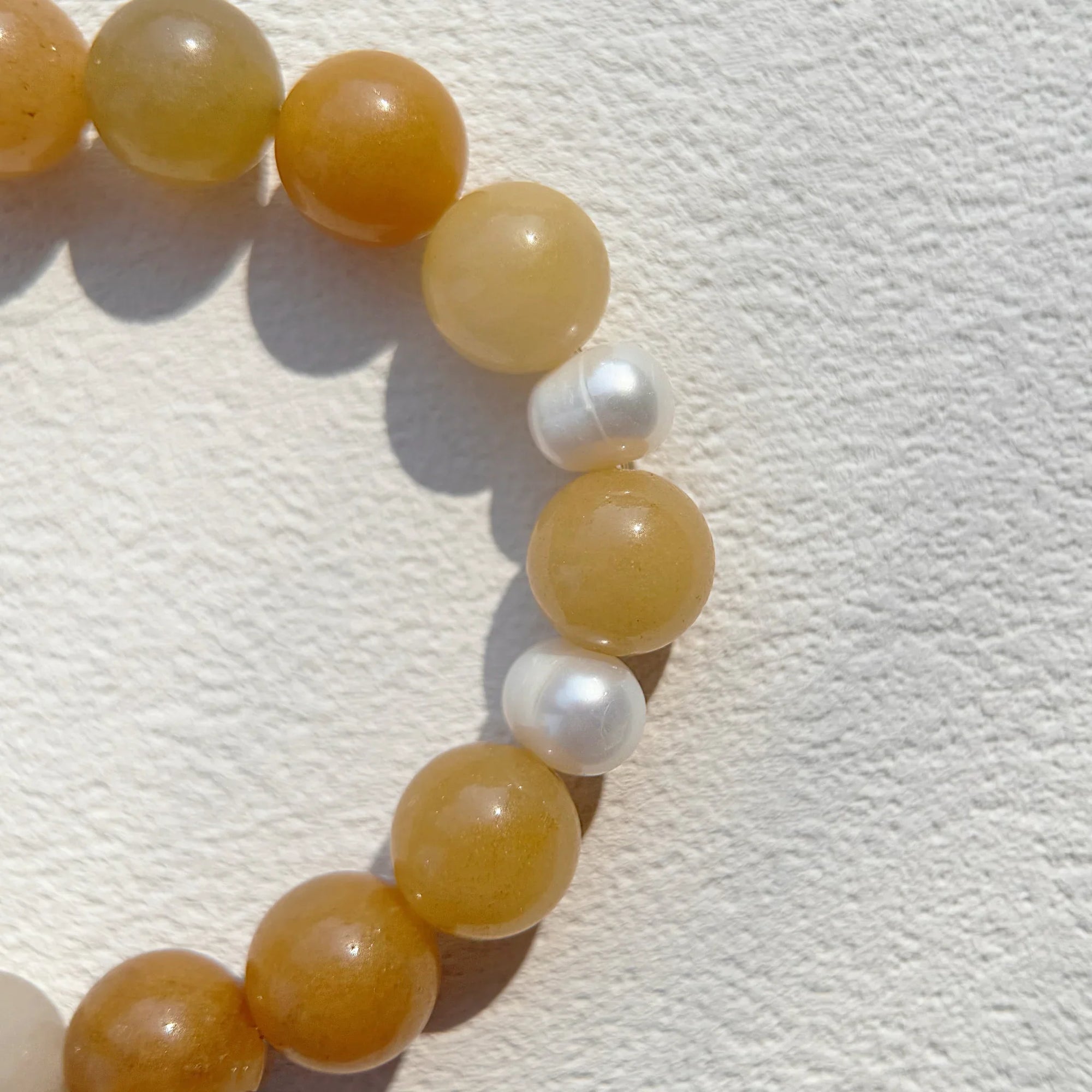 Close-up of Yellow Aventurine beads for confidence and success