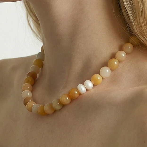 Amaré luz Yellow Aventurine Necklace and earrings on model 