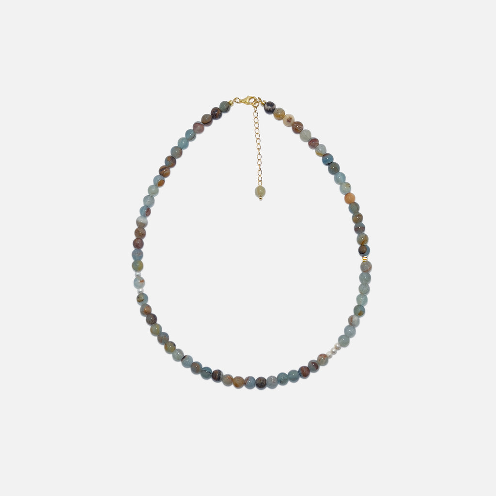 Blue Calcite Freya Necklace with 6mm natural gemstone beads, freshwater pearls, and subtle gold accents on a white background. Handmade crystal jewelry for calm energy and everyday elegance.