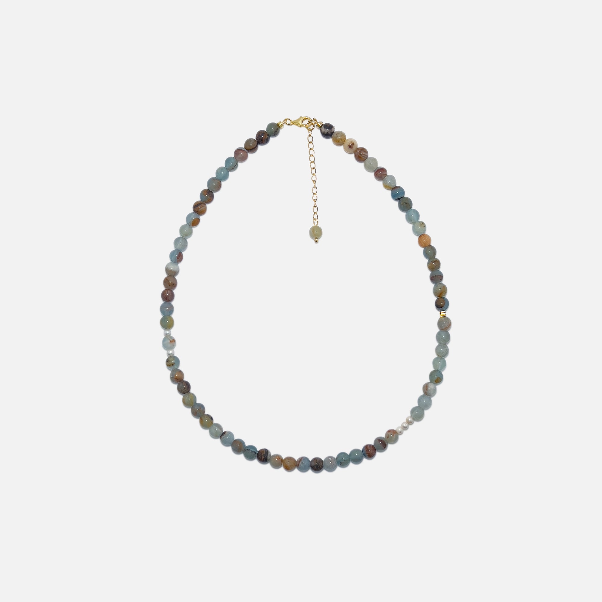 Blue Calcite Freya Necklace with 6mm natural gemstone beads, freshwater pearls, and subtle gold accents on a white background. Handmade crystal jewelry for calm energy and everyday elegance.