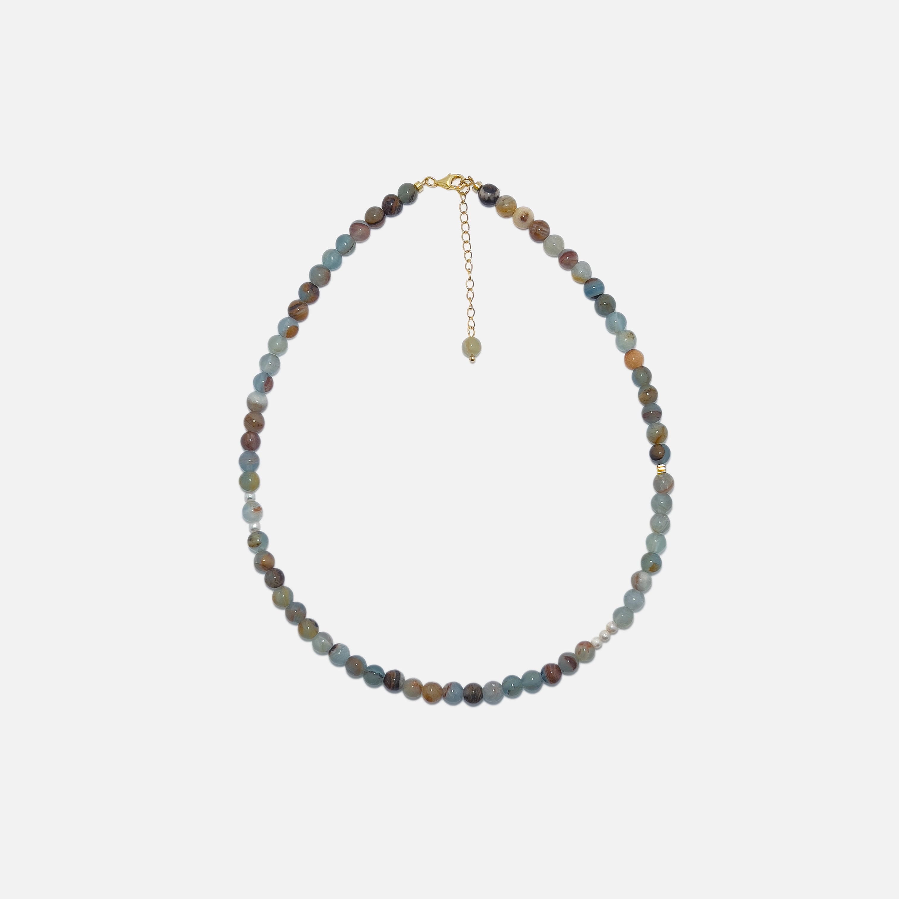 Blue Calcite Freya Necklace with 6mm natural gemstone beads, freshwater pearls, and subtle gold accents on a white background. Handmade crystal jewelry for calm energy and everyday elegance.