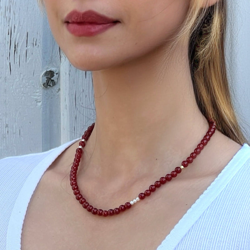 Red Agate Freya Necklace styled on model – handmade crystal jewelry for confidence and strength