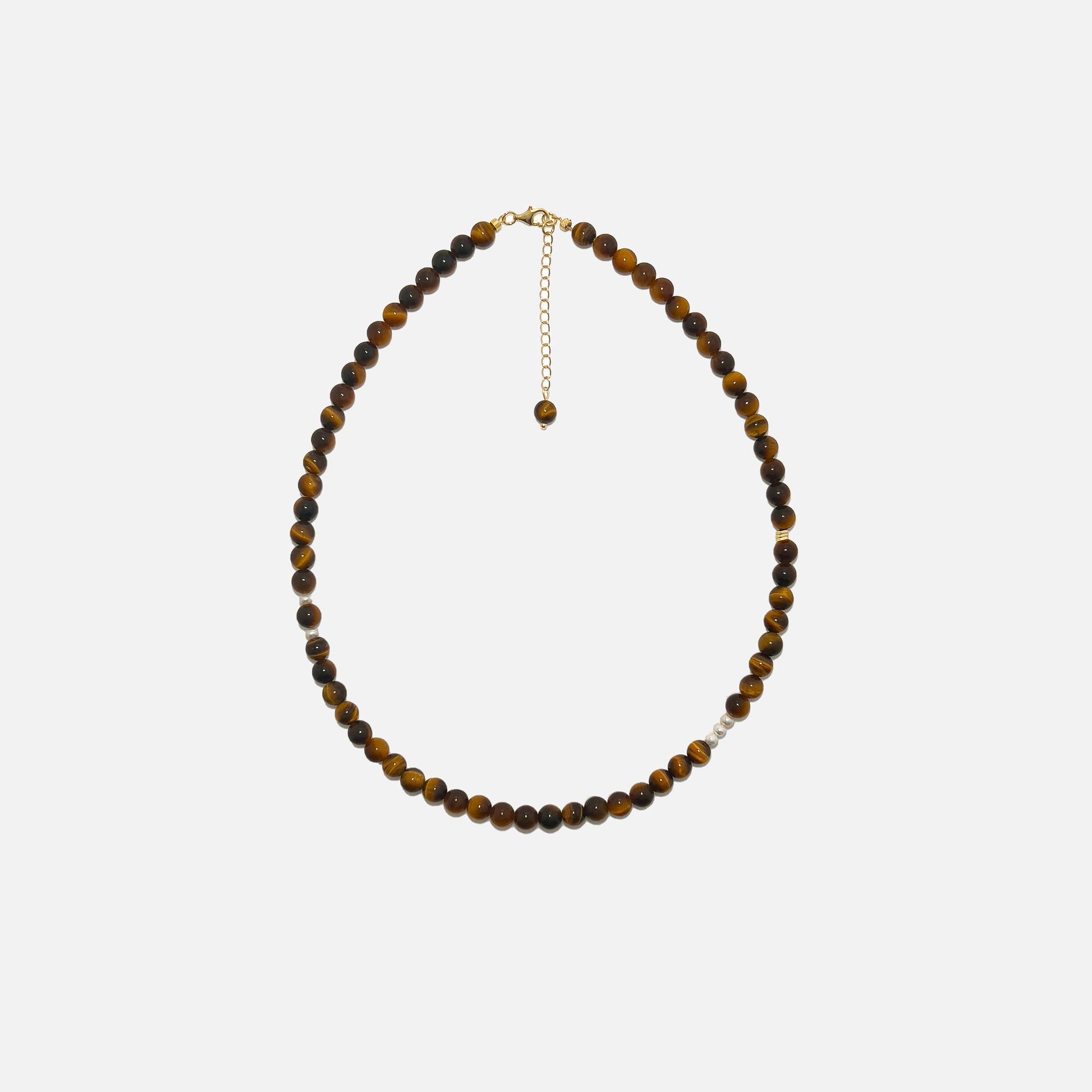 Tiger’s Eye crystal necklace with 6mm beads, freshwater pearls, and gold accents on a white background – handmade jewelry designed for confidence and inner strength.