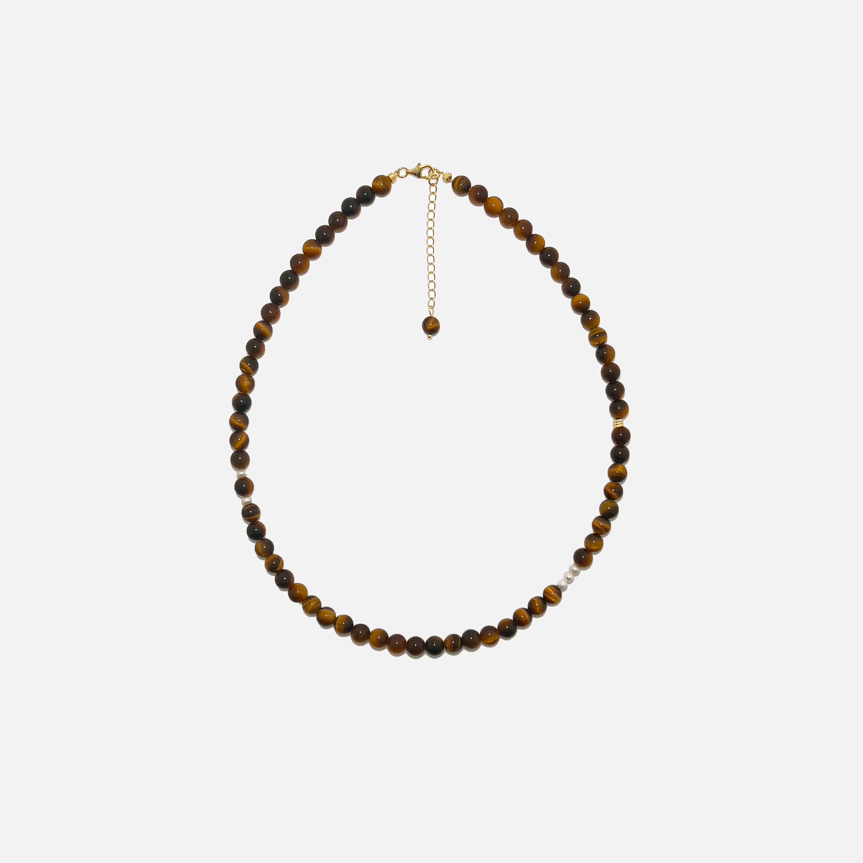 Tiger’s Eye crystal necklace with 6mm beads, freshwater pearls, and gold accents on a white background – handmade jewelry designed for confidence and inner strength.