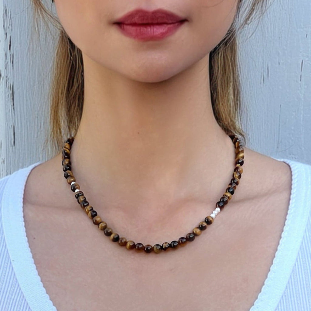 Model wearing the Tiger’s Eye Freya Necklace – handmade crystal jewelry for confidence and strength