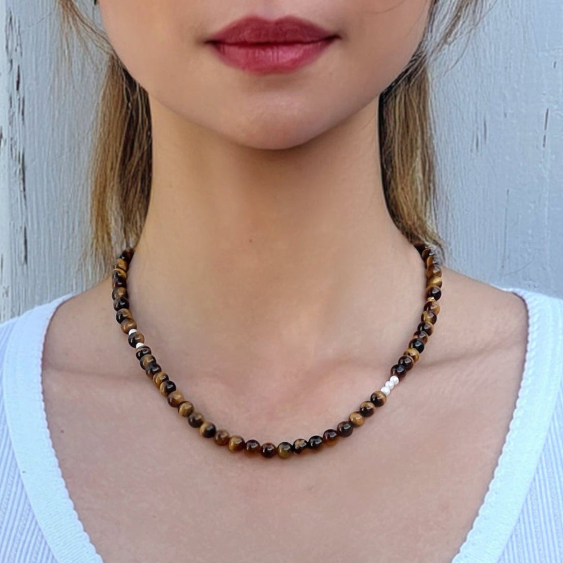 Model wearing the Tiger’s Eye Freya Necklace – handmade crystal jewelry for confidence and strength