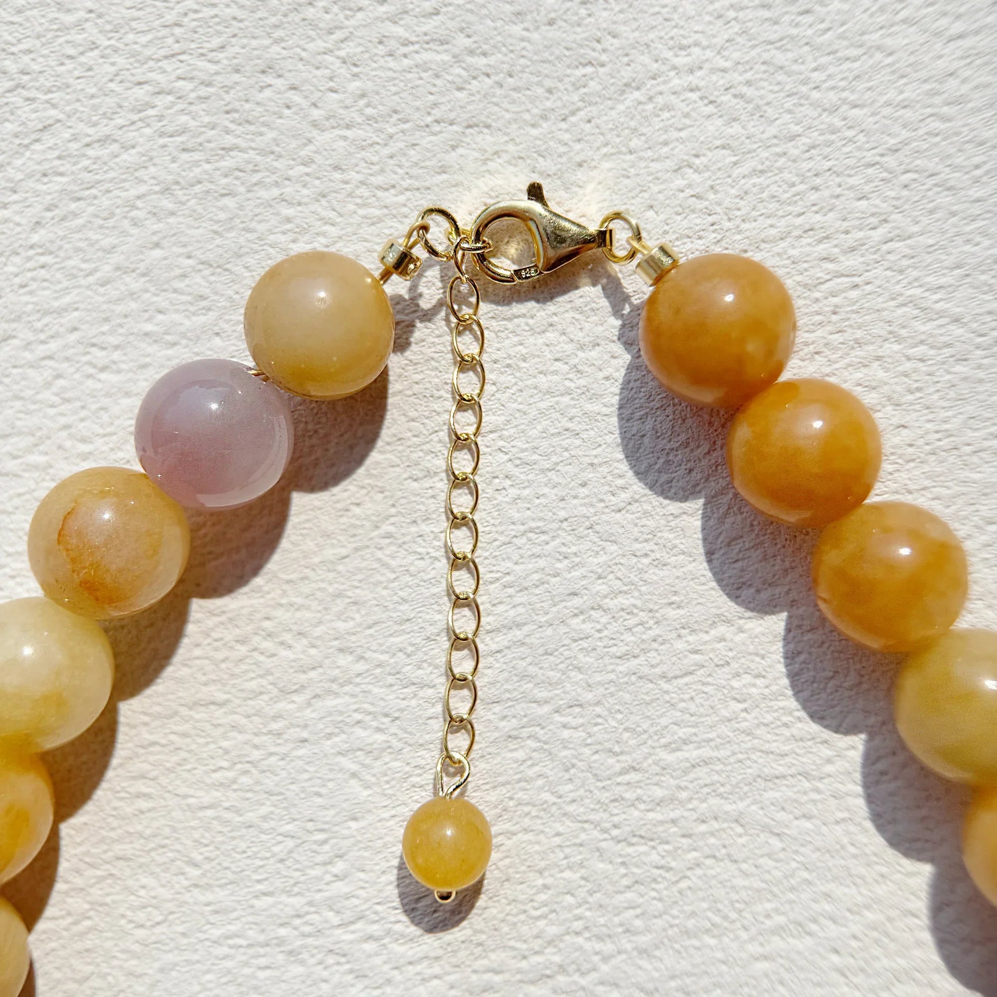 Close-up of Yellow Aventurine beads for luck and abundance